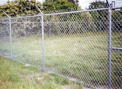 chain link security fence with barbed wire