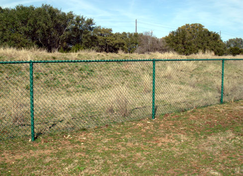 green chain link fence around property