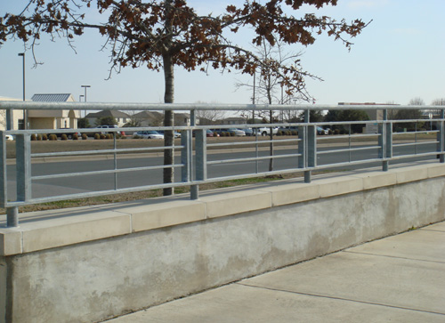 metal handrail around parking lot