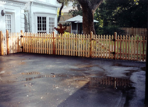 short fence around driveway with gate