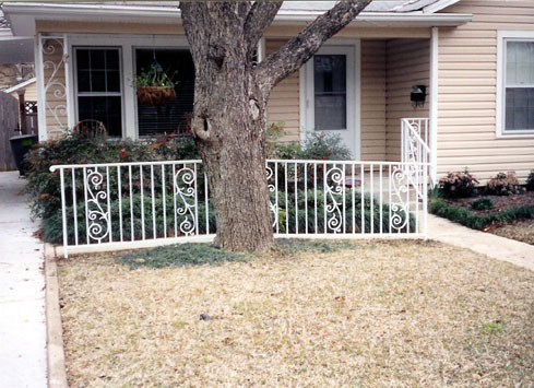 white handrail front of house