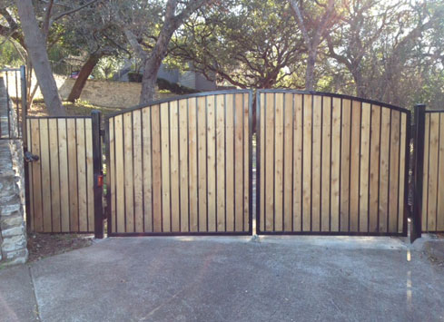 wood panel metal frame driveway gate