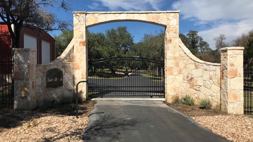 7_Custom-Arched-Ornamnetal-Drive-Gate-with-Custom-Arched-Rock-Entryway-and-Columns